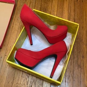 Red high heels Charlotte Russe size 8 worn once almost brand new